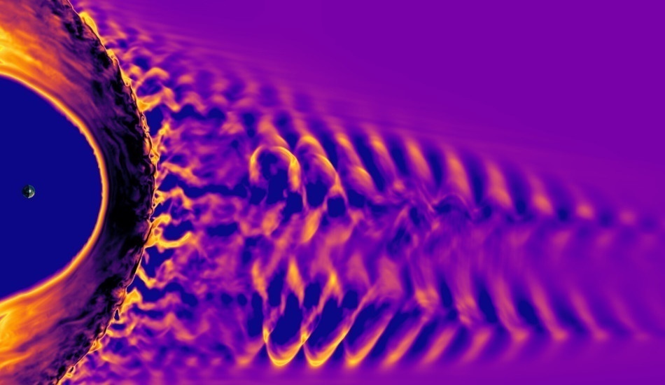 Sur cette image, le point situé sur la gauche représente la Terre et le grand arc qui l'entoure est l'arc de choc magnétique de notre planète. Le motif tourbillonnant à droite est le pré-choc, une région où le vent solaire se brise en vagues lorsqu'il rencontre les particules réfléchies par l'arc de choc. L'image a été créée à l'aide du modèle Vlasiator, une simulation informatique développée à l'Université d'Helsinki pour étudier l'interaction magnétique de la Terre avec le vent solaire. (Image: équipe Vla